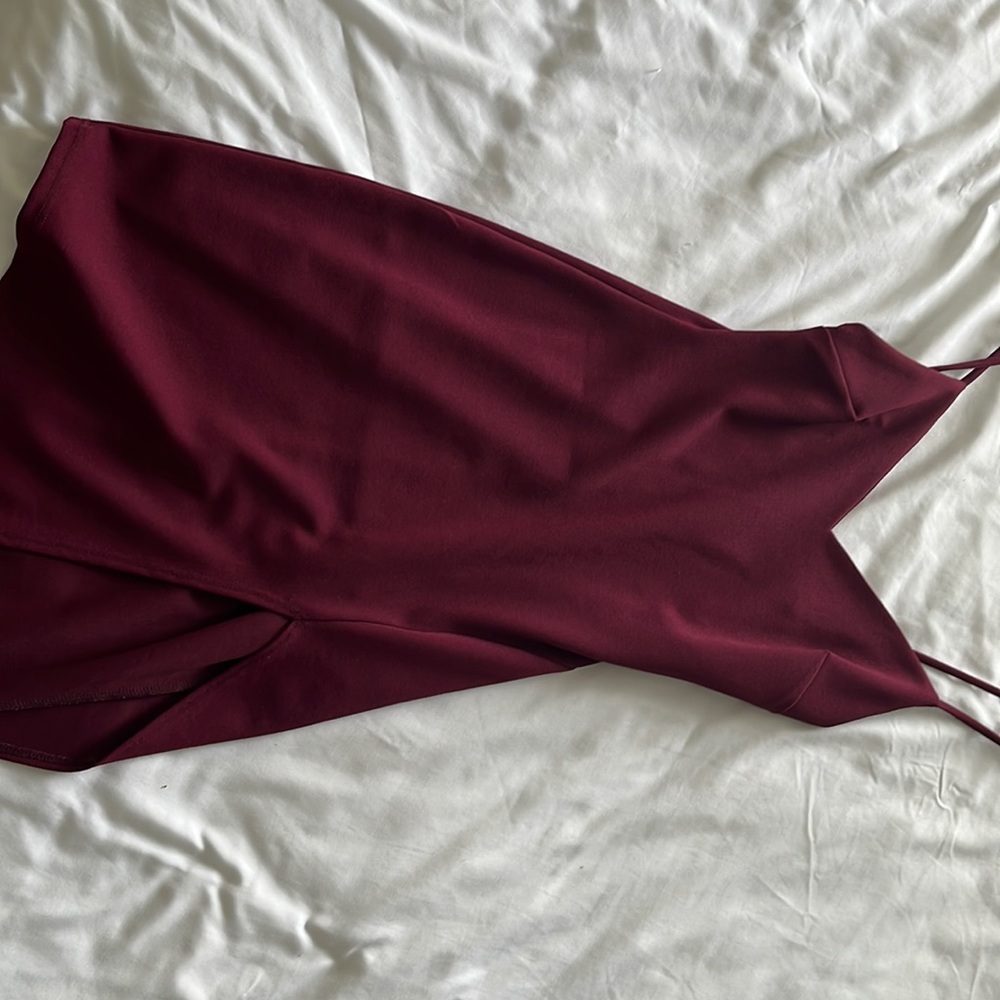 maroon dress, open slit in leg, asymmetrical, fitted dress